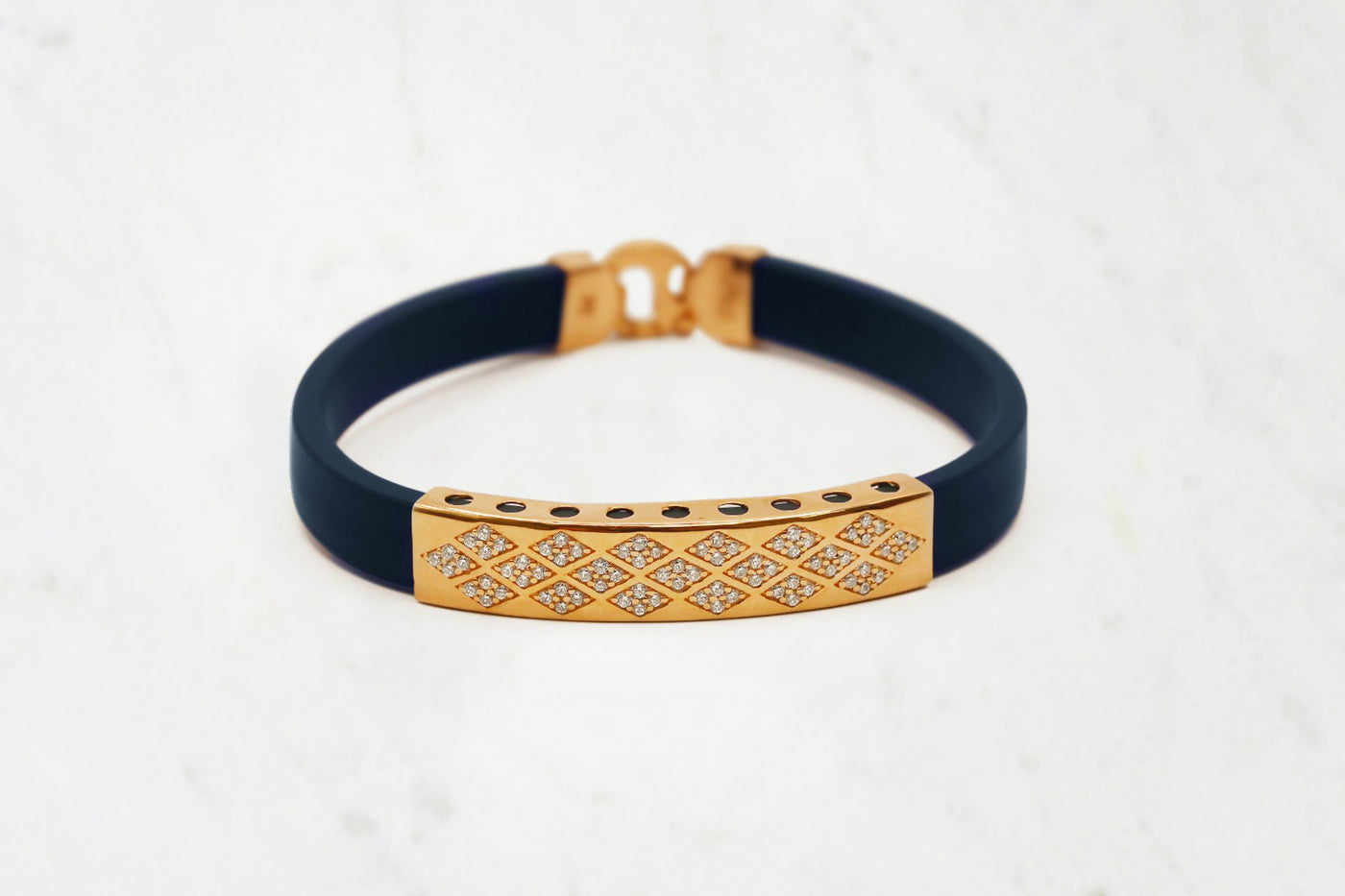 navy blue silicon bracelet with cubic zirconia stones on rose gold