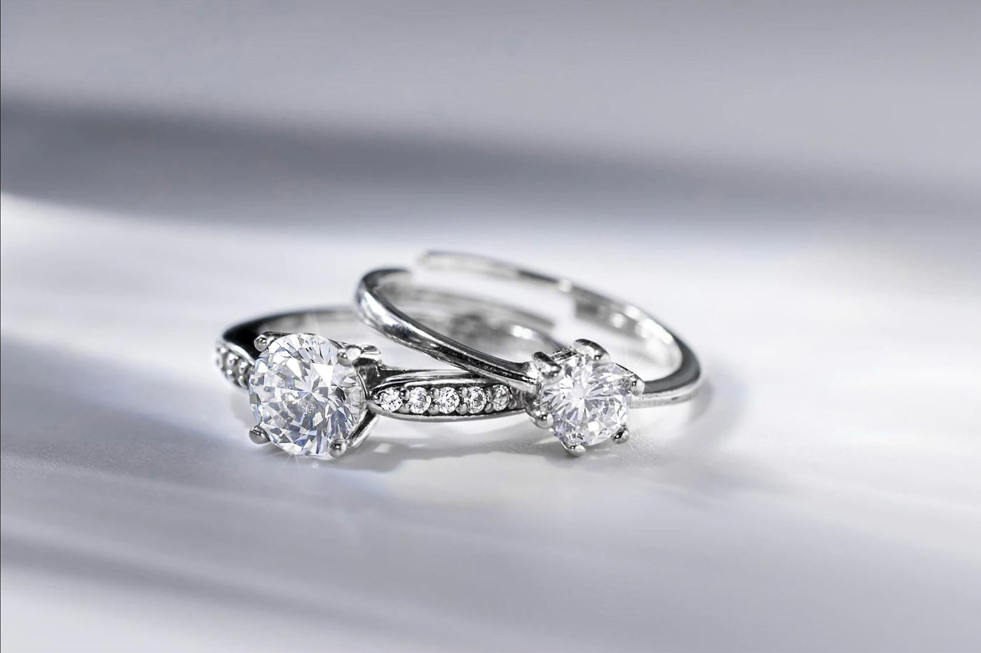 lab grown diamond wedding rings lying together
