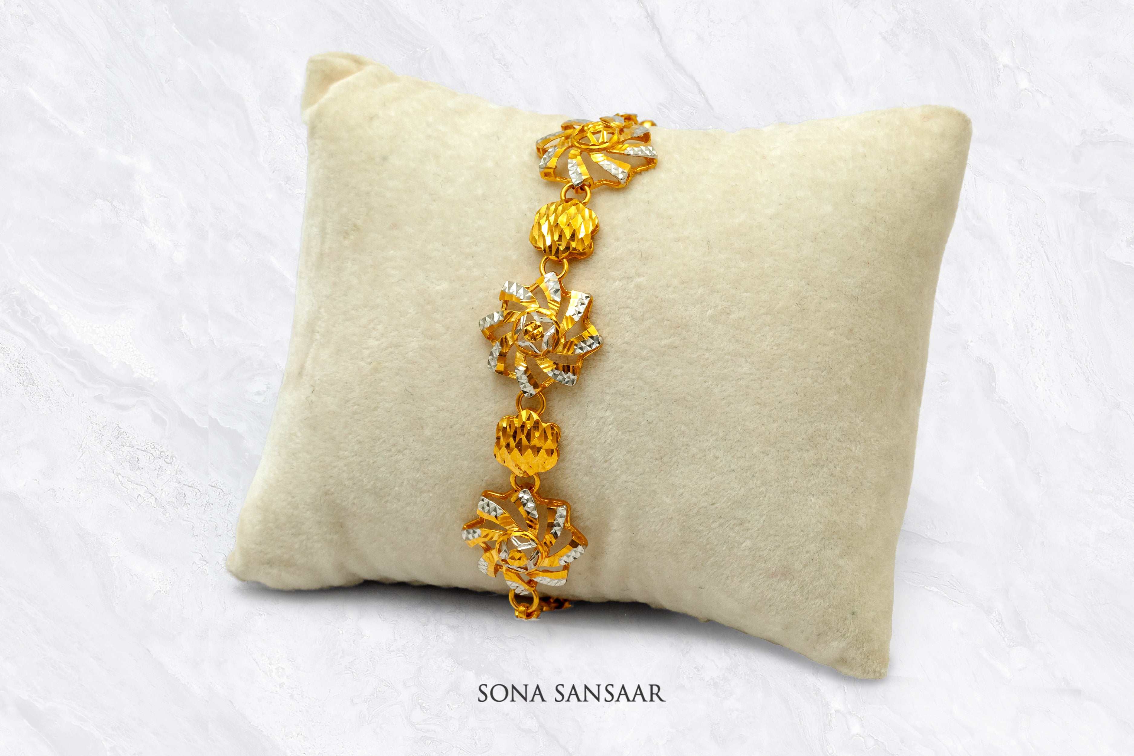 Whirl Two Tone Gold Bracelet | Sona Sansaar