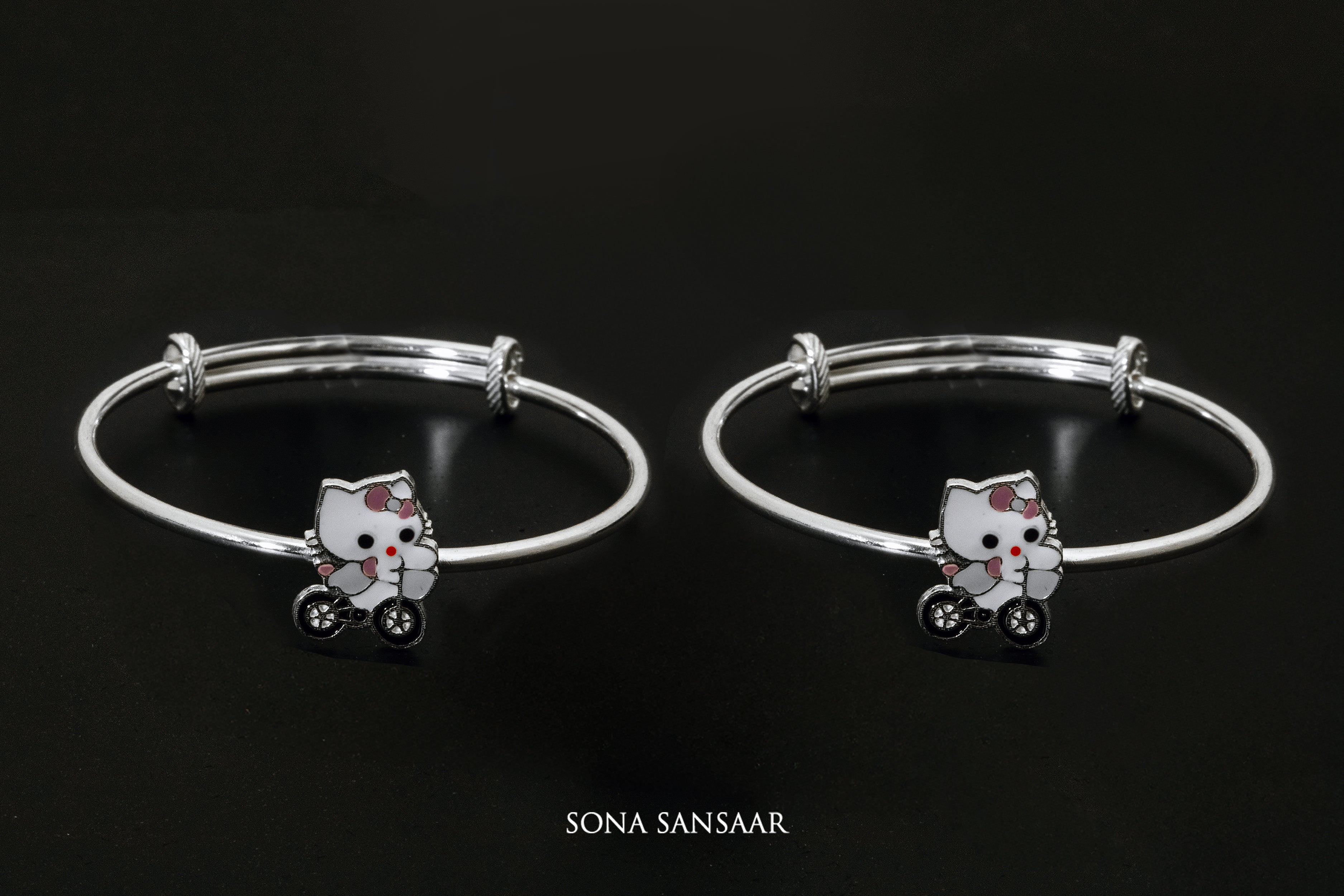 Kitty Wheels Silver Bangle | Sona Sansaar