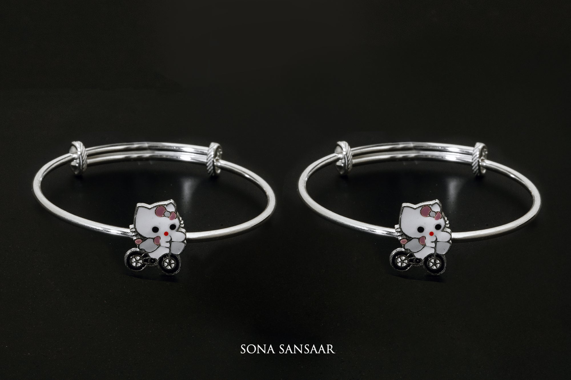 Kitty Wheels Silver Bangle | Sona Sansaar