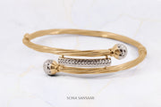 Connected Beads Two-Toned Spring Clasp Gold Bangle | Sona Sansaar