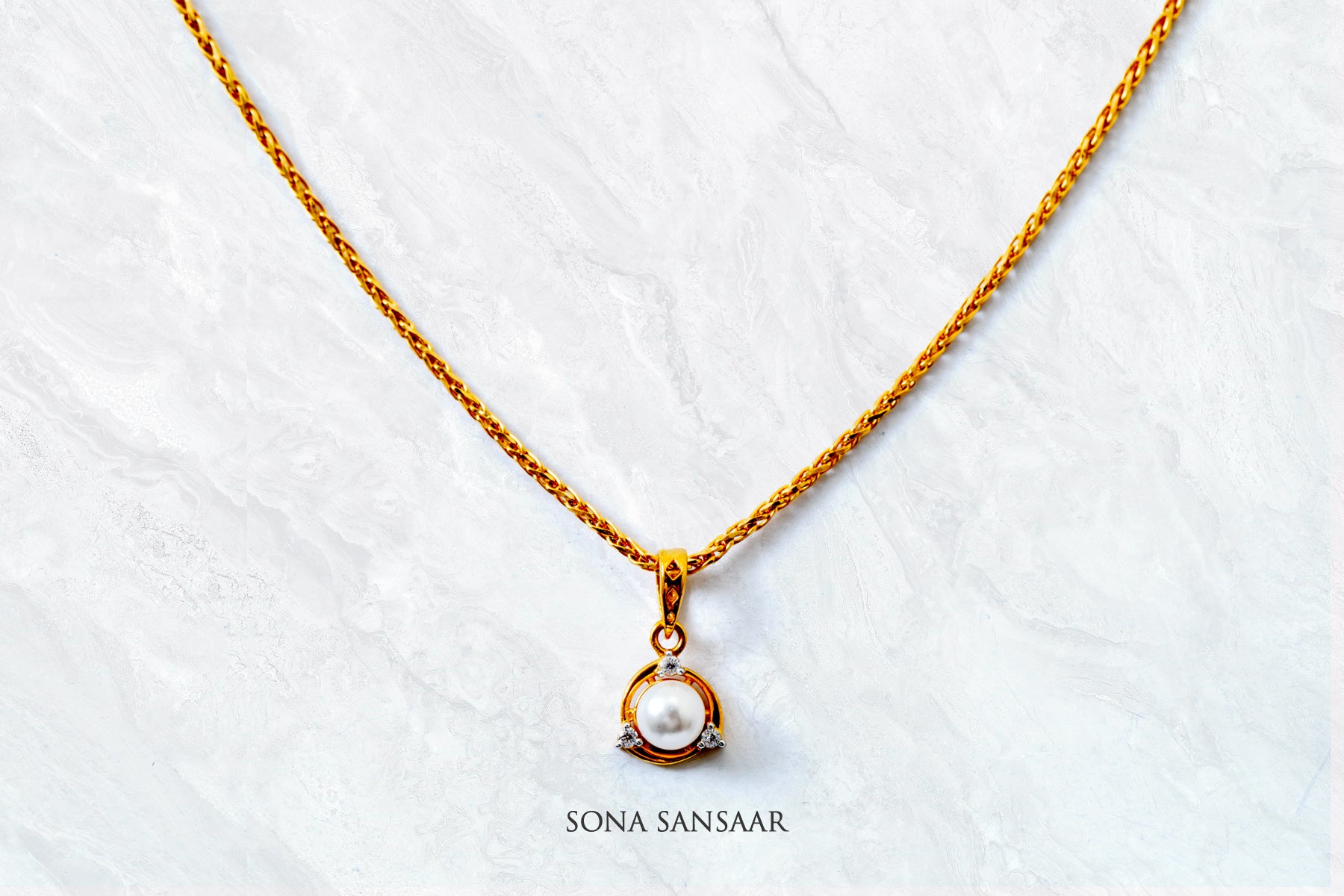 Sitara Pearl Gold Pendant and Earring Set | Sona Sansaar