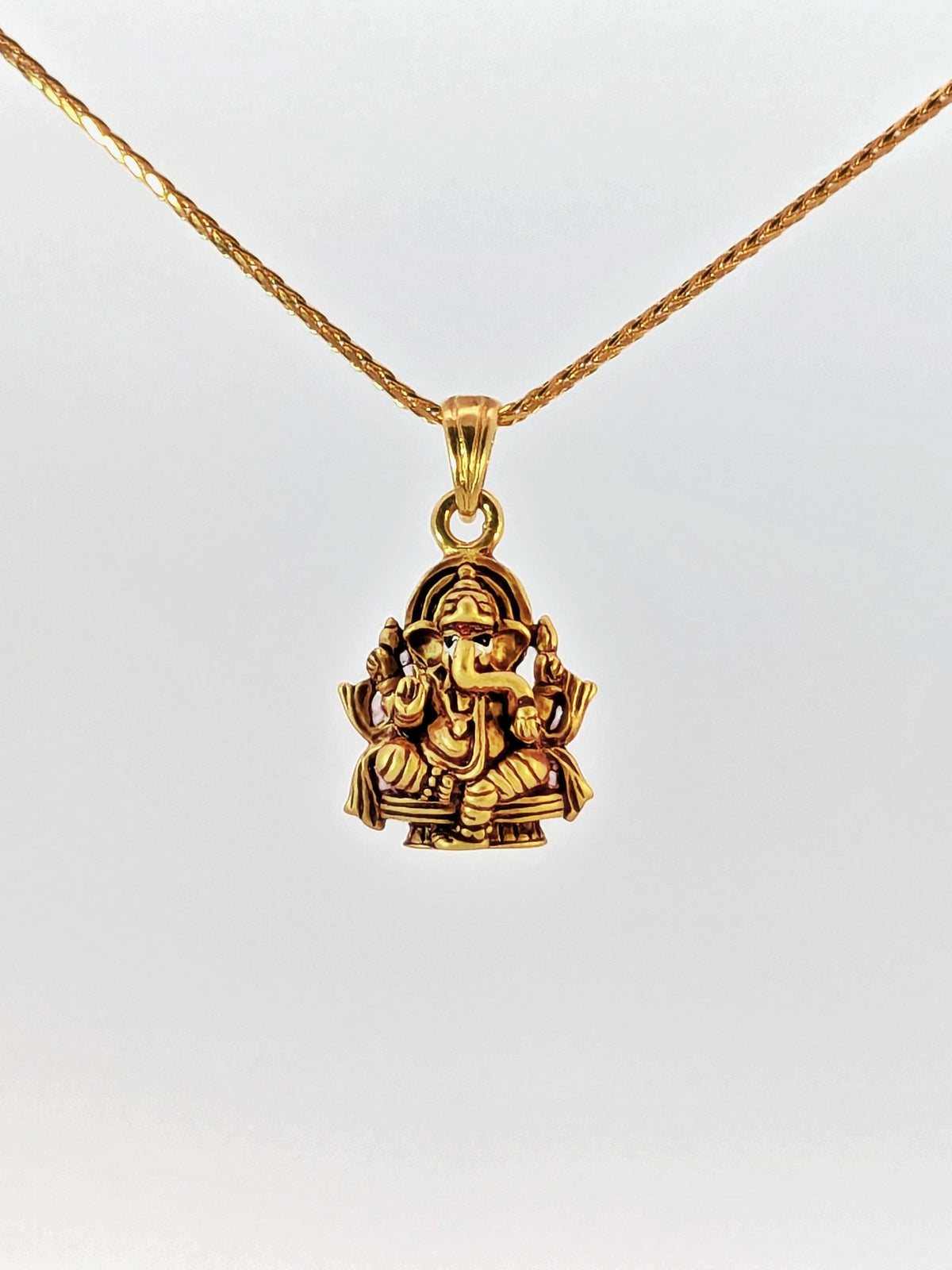 22K Yellow Gold Seated Lord Ganesh Antique-Finish Devotional Pendant