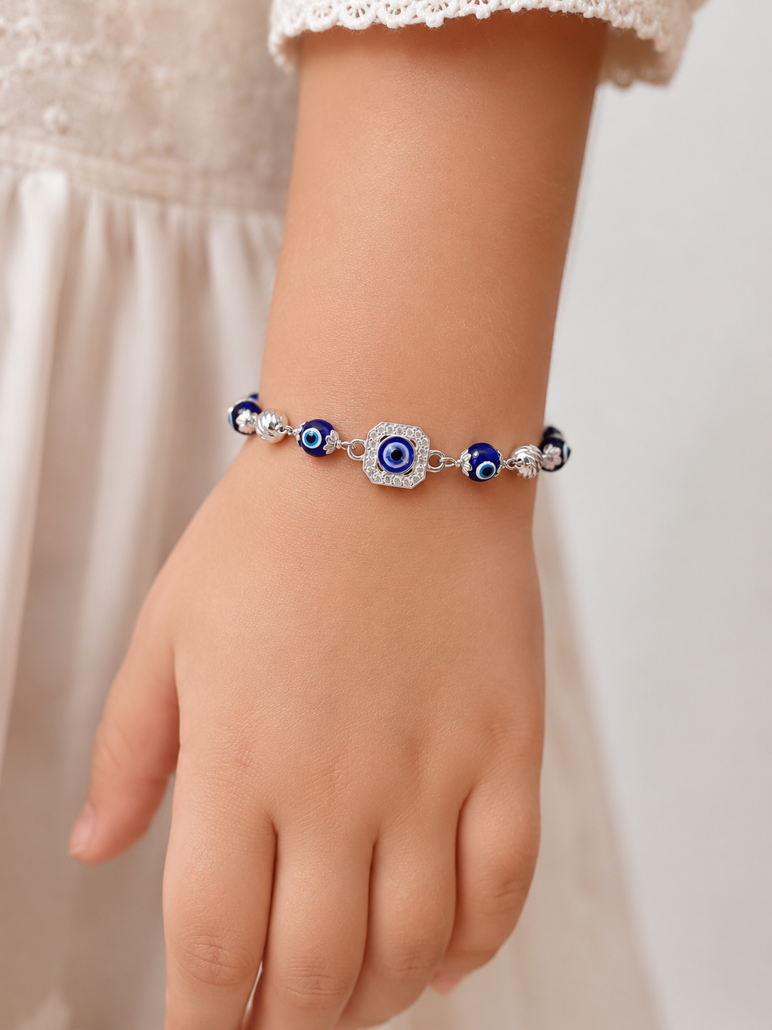 Sterling Silver Protective Evil Eye Kids Charm Bracelet | Shimmering Cubic Zirconia Halo, Royal Blue Glass Beads & Textured Silver Accents