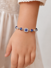 Sterling Silver Protective Evil Eye Kids Charm Bracelet | Shimmering Cubic Zirconia Halo, Royal Blue Glass Beads & Textured Silver Accents