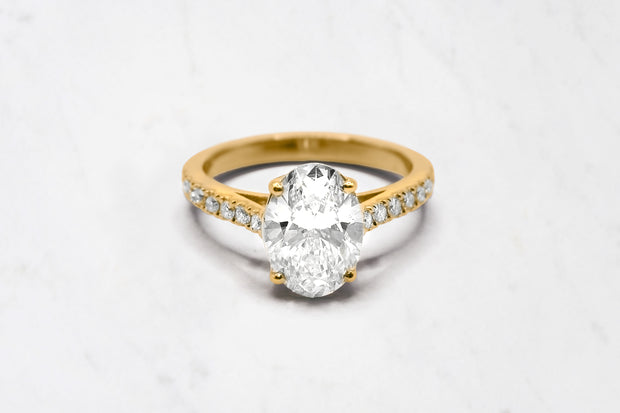 Oval Brilliant Cut Diamond Ring with Shoulder Diamonds in Yellow Gold- 2.22ct (Lab Grown)